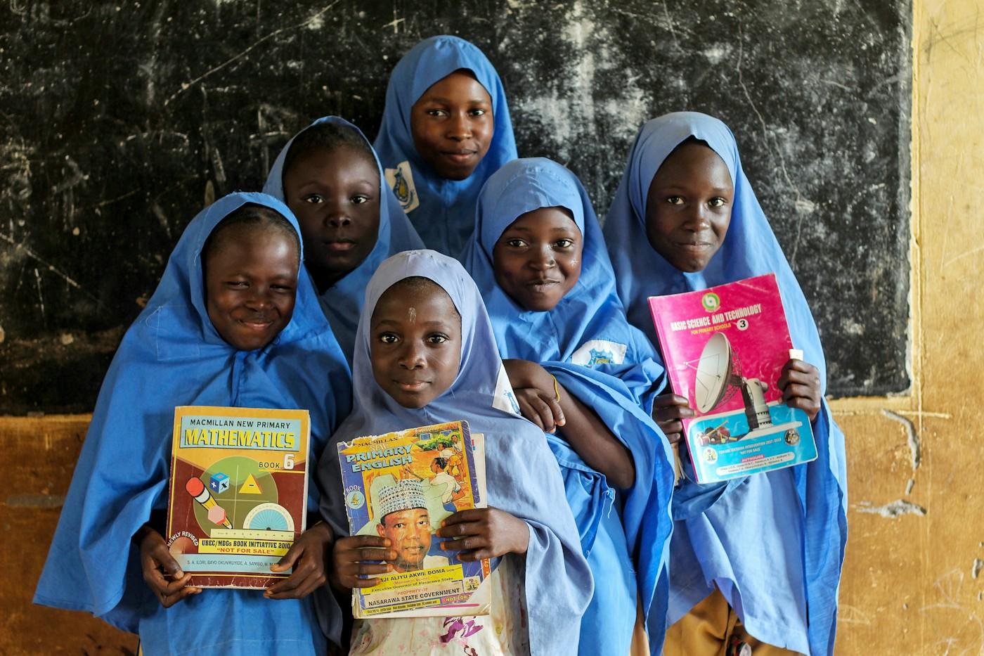 One book for a pupil, ten dozen for a school.